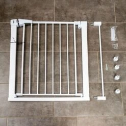 TIAKI White Dog Gate With 7 Cm Extension Height 76 Cm, Width 75 To 82 Cm 20 TIAKI White Dog Gate With 7 Cm Extension Height 76 Cm, Width 75 To 82 Cm -Zoo Plus 334597 tiaki dog gate white fg 8223 9